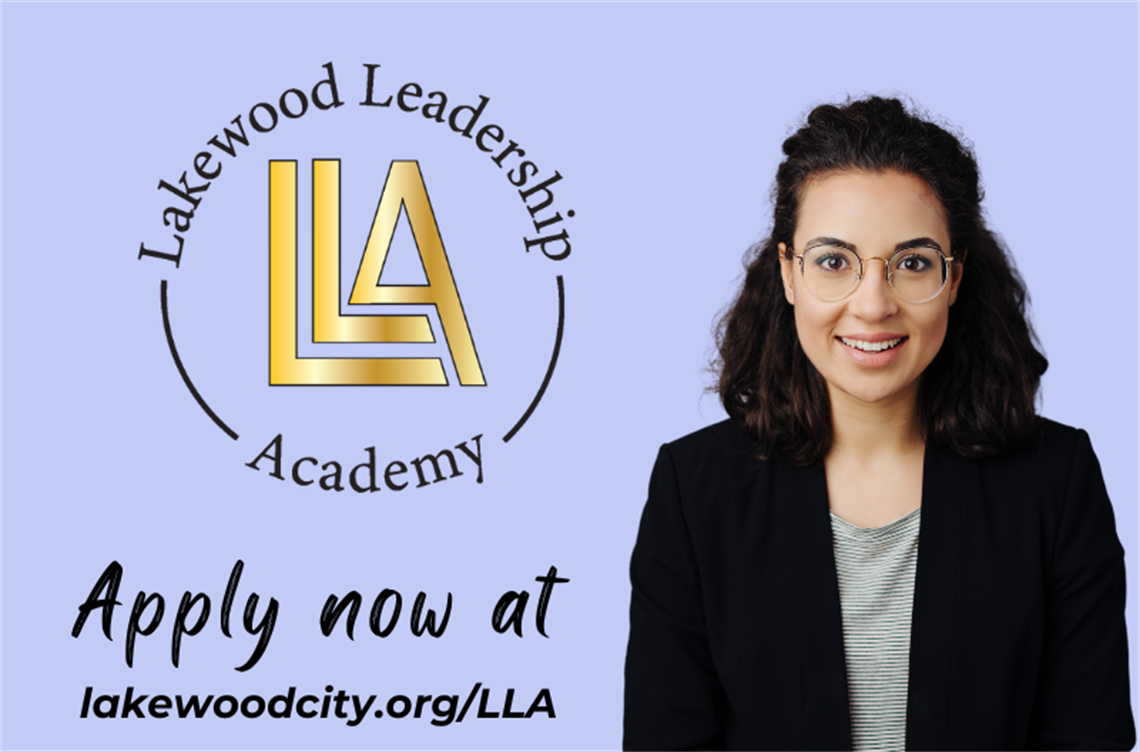 Smiling woman with Lakewood Leadership Academy logo