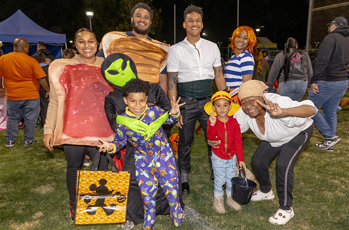 Family at carnival dressed in costumes